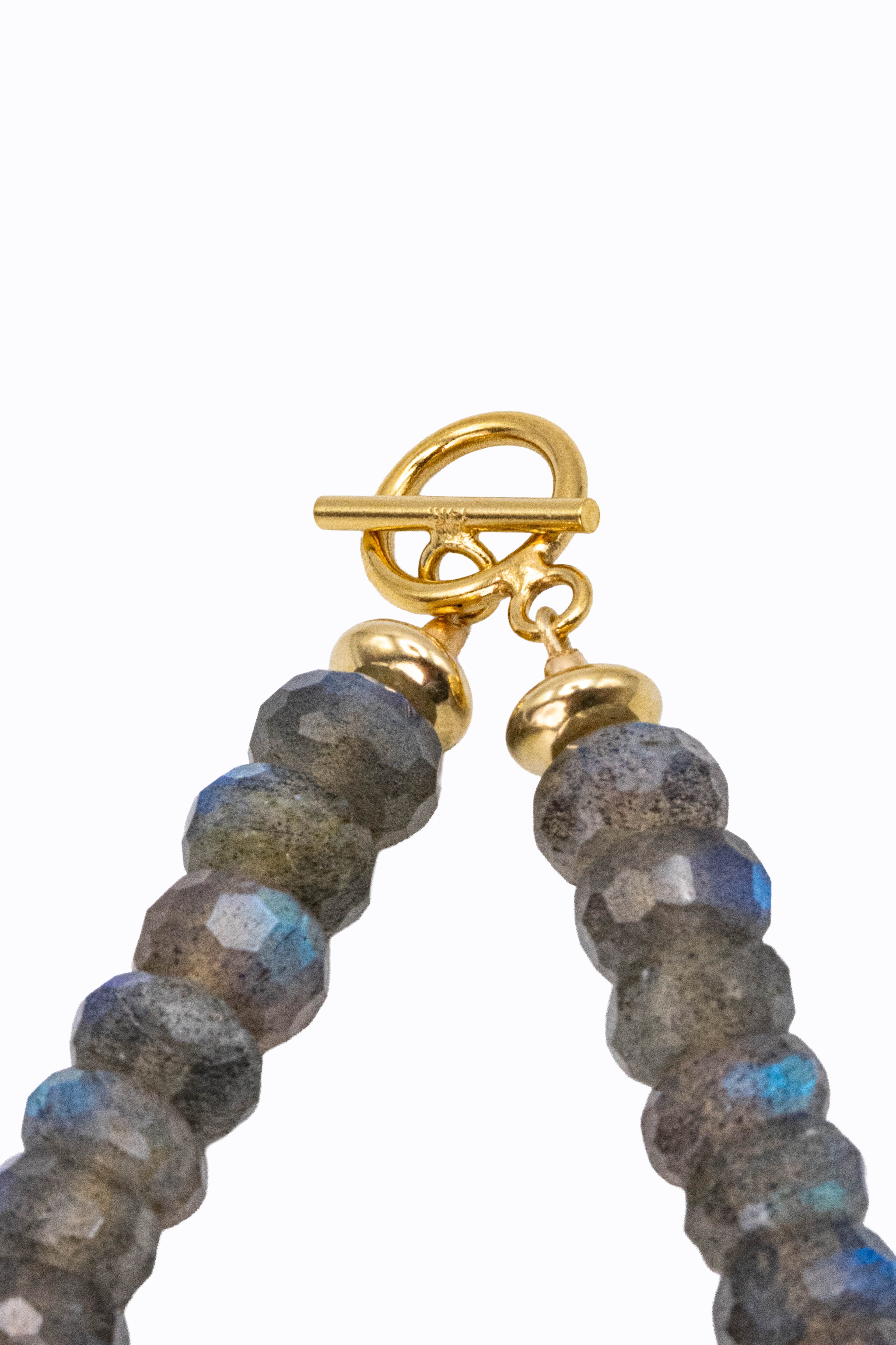 Detail of Dusky necklace 14k yellow gold toggle clasp with faceted labradorite rondelles showing blue flash by Alexandra Essex