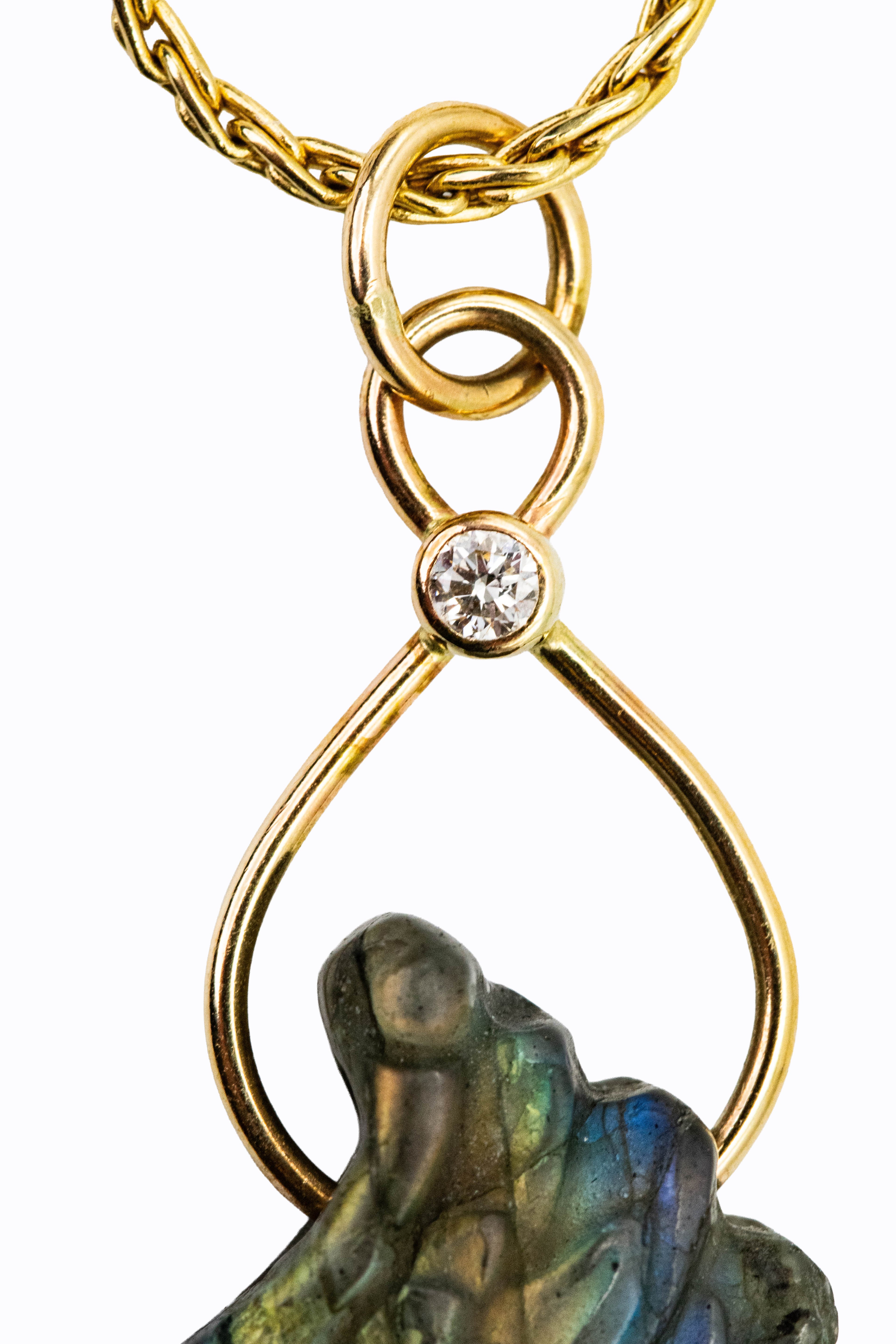 L'Aile 14k pendant detail showing bezel-set diamond accent and carved labradorite wing on gold chain by Alexandra Essex