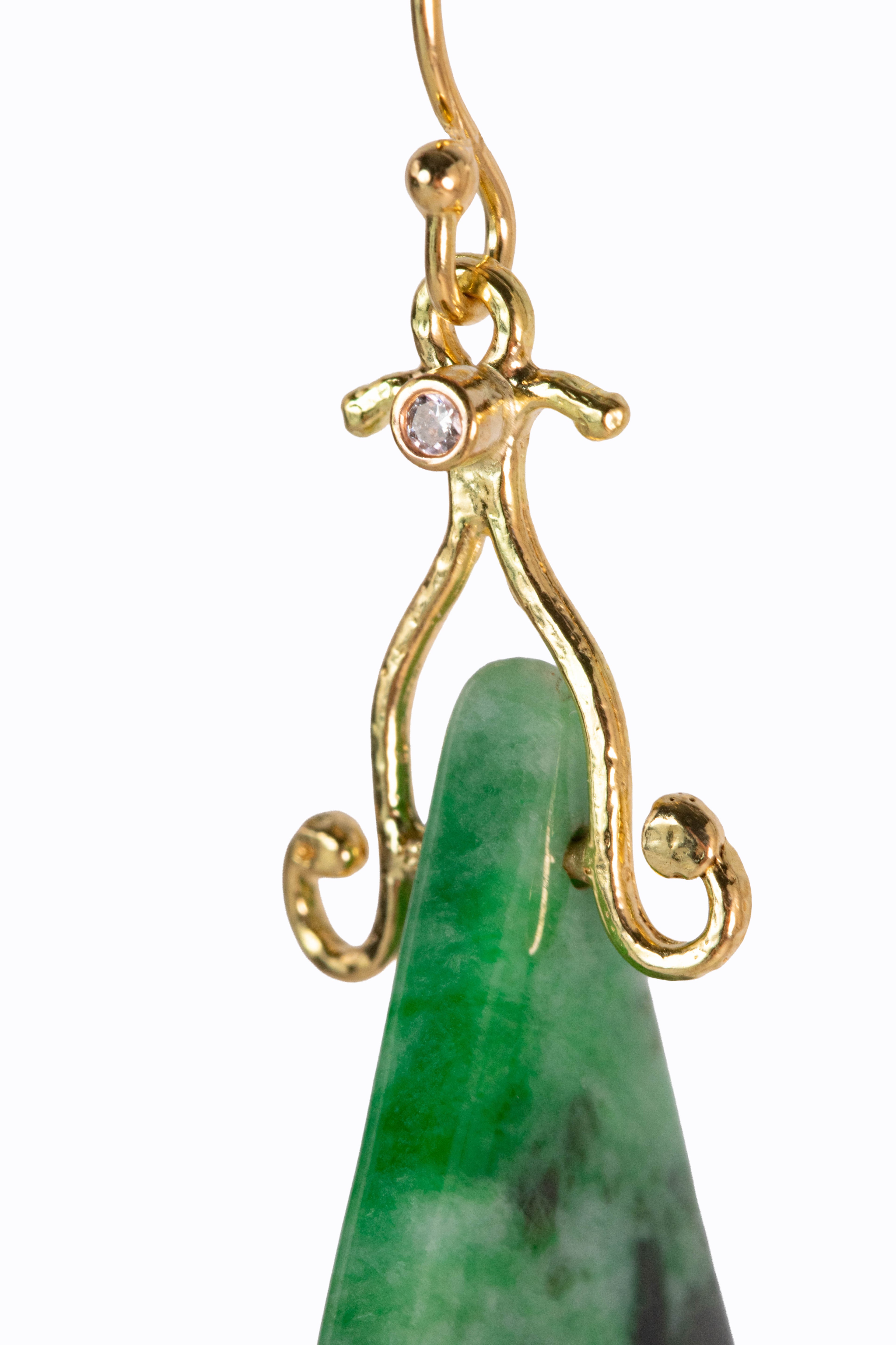 Maw Sit Sit jade fan earring close-up showing deep mottled green stone with 18k gold hook and bezel-set diamond by Alexandra Essex