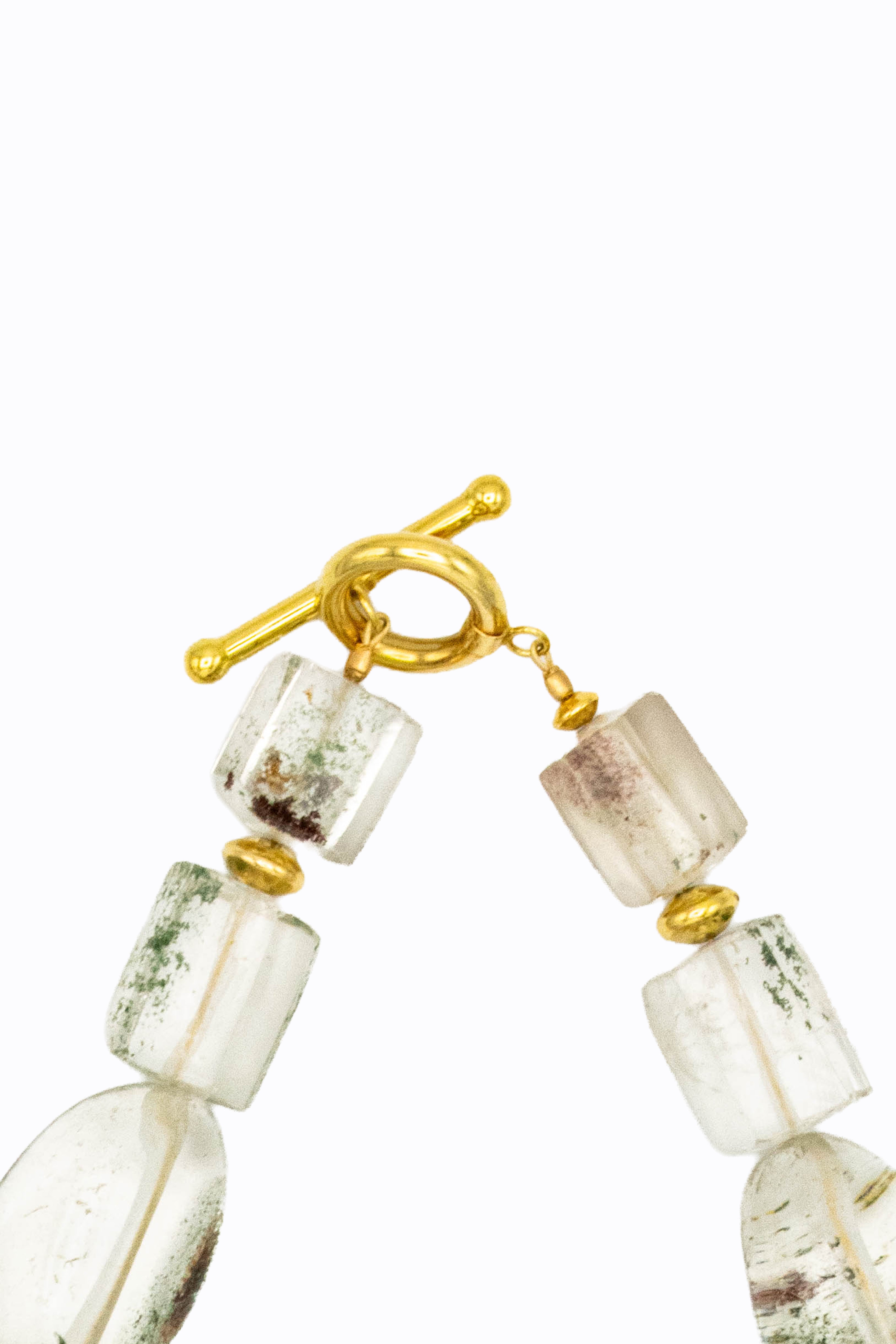Detail of Phantasm necklace 14k yellow gold toggle clasp with phantom quartz nuggets showing green ghost inclusions by Alexandra Essex